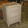 Custom furniture style vanity with fluted columns, bun feet and operating drawers- received granite top and under mounted sink