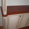 Painted Oak cabinetry with reeded spindles and turned plinths resting on 6/4 solid cherry counter 